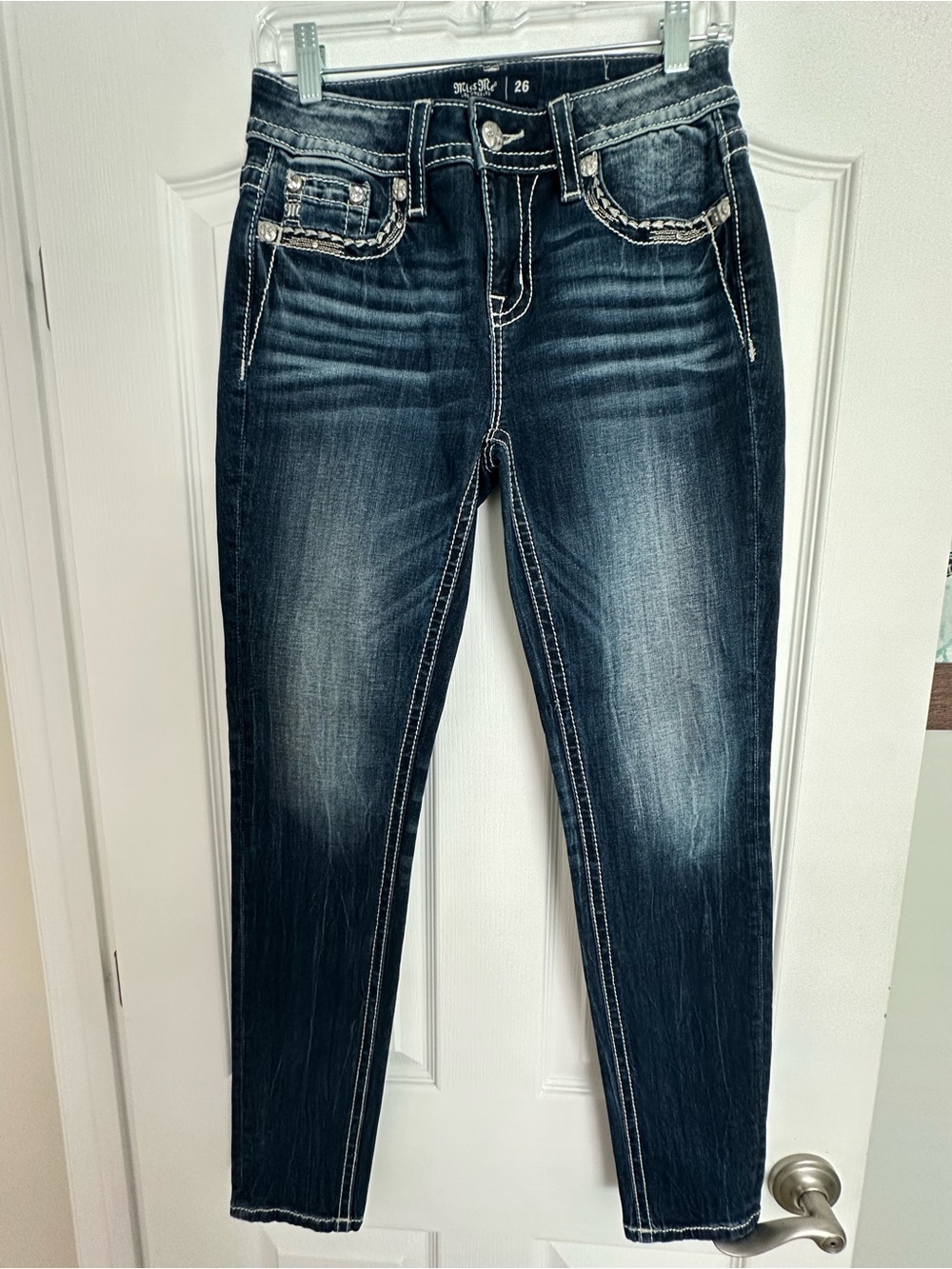 MISS ME NWOT Mid-Rise Skinny Gorgeous Jeans with embellished pockets.